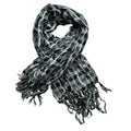 Black and white checkered scarf with fringes on a white background