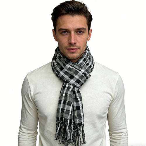 Man wearing a plaid scarf on a white background